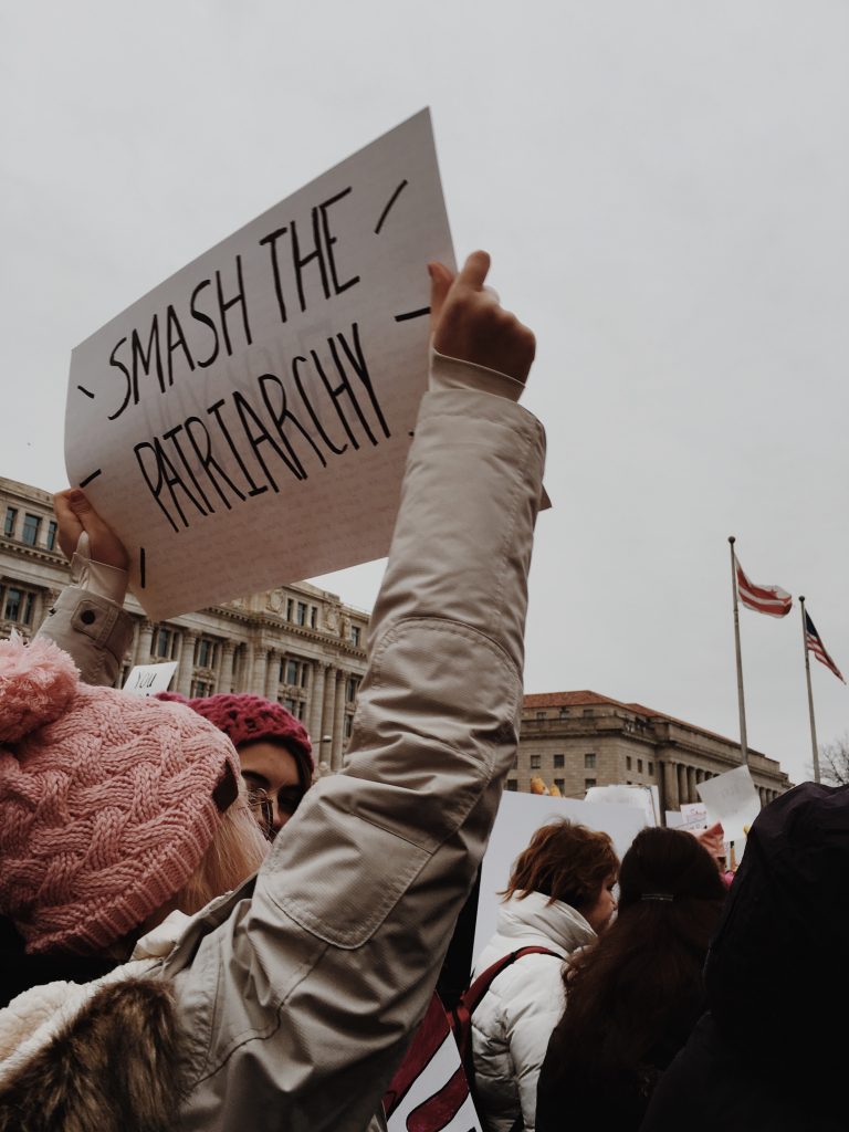 protest sign that says smash the patriarchy