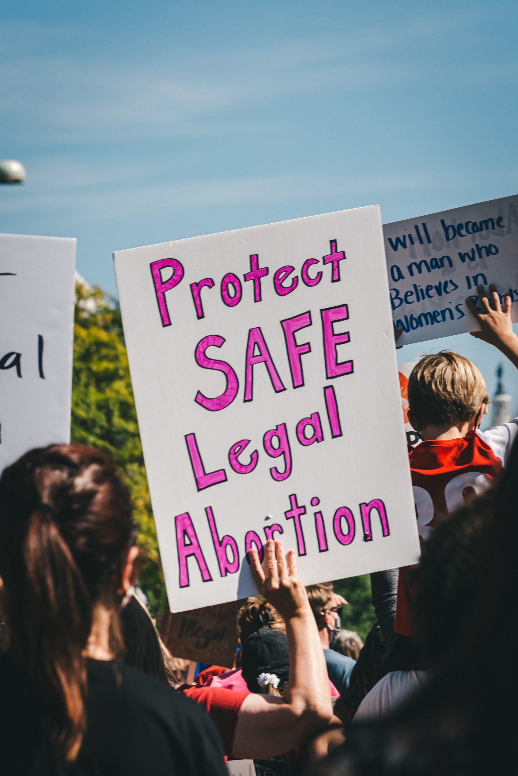 protest sign that says protect safe and legal abortion