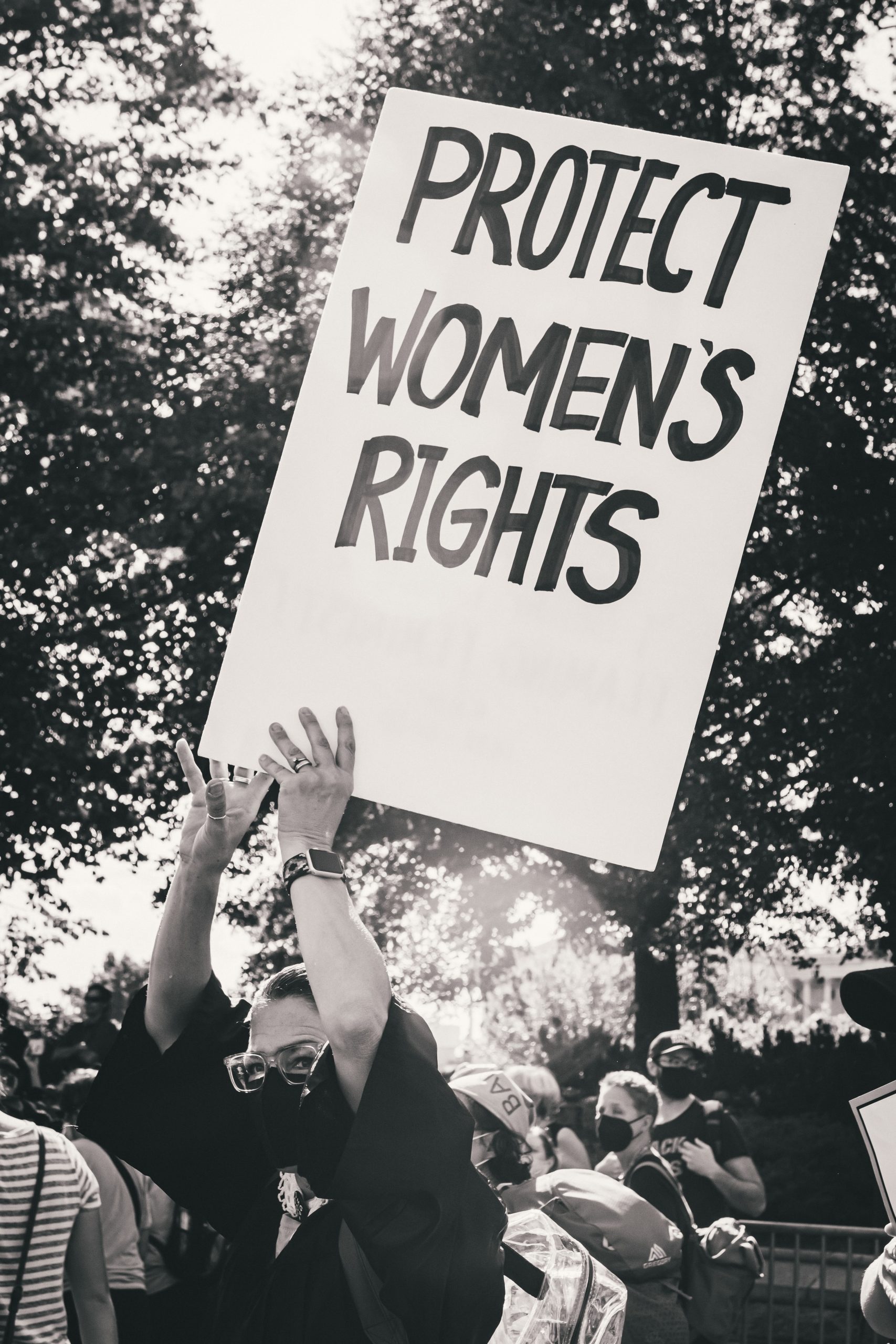 protest sign that says "protect women's rights"