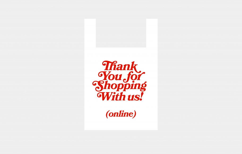 white shopping bag with red lettering