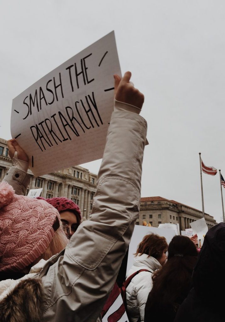 protest sign that says smash the patriarchy